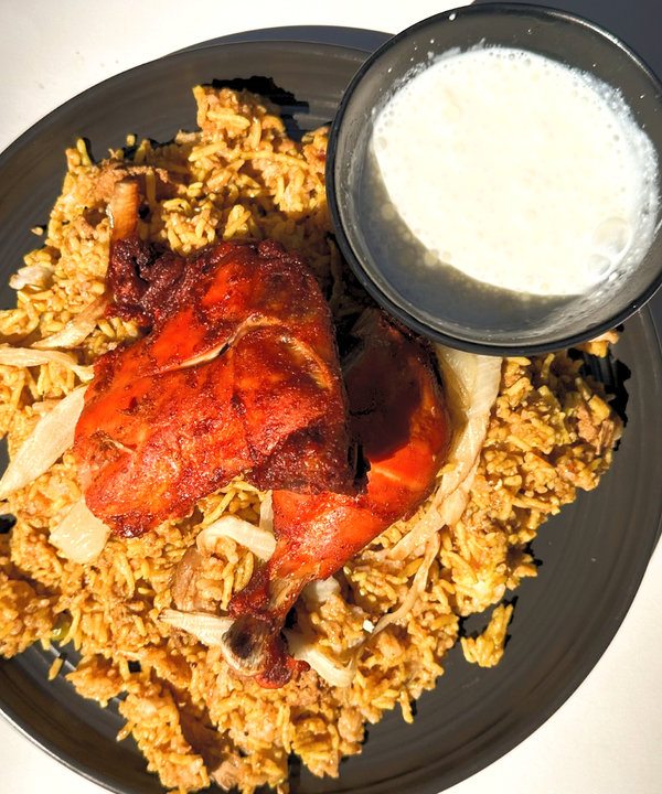 Aromatic chicken biryani with raita
